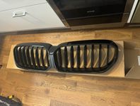 Svart BMW 5 serie grill