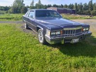 Cadillac Deville  Coupé 7.0 (Bakhjulsdriven).   Ev byte