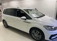 Volkswagen Touran 1.5 TSI 7 sits