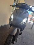 piaggio one plus elvespa med lastbox. 