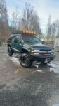 Chevrolet Tahoe 6,5 td a traktor 