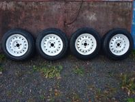 13" Opel plåtfälg 4/100 med vinterdäck.