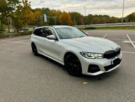 BMW 330e Touring M Sport HK NAV Drag