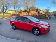 Ford Focus 1.8 Flexifuel Titanium kombi 