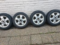 4 st dubbade vinterdäck med fälgar av märke Pirelli