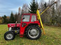 Massey Ferguson 135 med skogskran och snöblad 225 cm