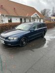 Volvo v70n a traktor (ny besiktad)