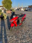 Aprilia SRX50 Klass 1