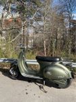 Elmoped Evolt Vespa