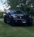 Nissan Titan 5.6 V8 Hybrid 22” fälgar Höjd 4” Rosfritt 3,5”