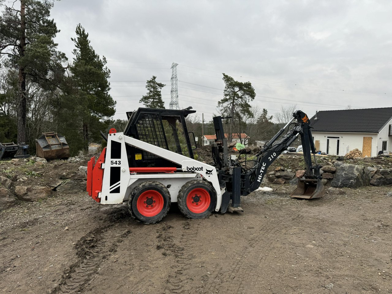 Bobcat 543 med grävaggregat H...
