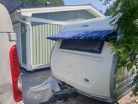 Fönstermarkis husvagn