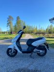 Moped + hjälmar