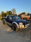 Nissan King Cab A-traktor