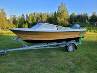 Båt med 65 hk suzuki -99