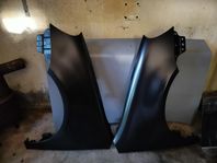 lackerade nya framskärmar, strålkastarrenovering m.m