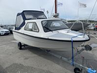 Motorbåt med 90 hk motor + släp