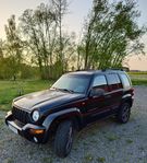 A-traktor Jeep Cherokee 