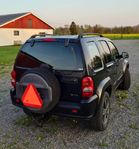 A-traktor Jeep Cherokee 