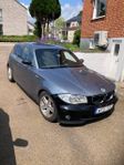 BMW 120 i Advantage Euro 4 säljes i befintligt, defekt skick