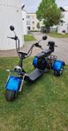 elmoped trehjuling