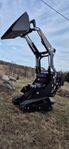 Multilastare med hydraulisk shaktblad, skopa och pallgaffel
