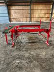 Hydrauliskt stockbord till vedmaskin