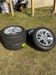 Snygga Audi-fälgar med fräscha däck 205/60 R16 uppsättning