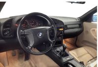 BMW 318 i Convertible låg mil svensk såld 