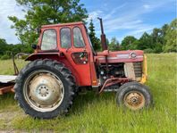 MF165 med frontlastare och tillbehör