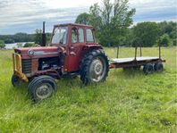 MF165 med frontlastare och tillbehör