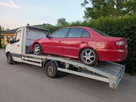 Biltransport - Bilbärning - Maskinstransport 