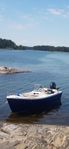 öppen båt med utombordate suzuki DFS 20