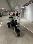 Trehjulad elmoped