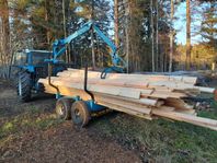 Traktor med Skogsvagn