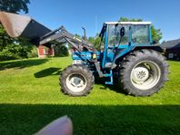 Traktor med Skogsvagn
