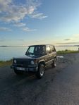 A-traktor Mitsubishi Pajero -90