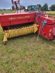 Hårdpress New Holland 377 med Duks balkastare