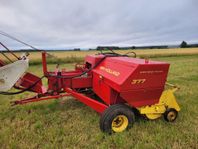 Hårdpress New Holland 377 med Duks balkastare