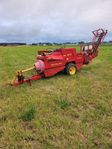 Hårdpress New Holland 377 med Duks balkastare