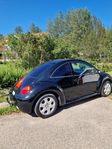 A-traktor VW New Beetle 2003 - Automat