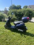 Fin elmoped i nyskick