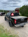 A Traktor Nissan Navara d40