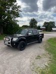 A Traktor Nissan Navara d40