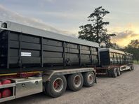 Lastväxlarsläp med containrar