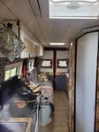 Unik campervan/plåtis med vedeldad braskamin!