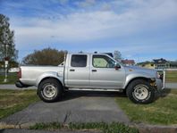 Nissan Navara D22 A-traktor