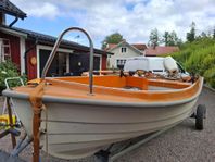 Styrpulpet båt Askeladden med "30" Johnson motor