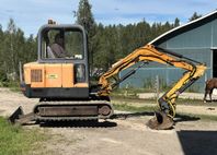 Hanix H35A minigrävare med traktorvagn.