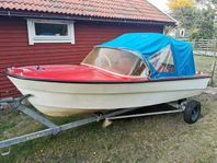 Monark med Johnson 25hk och släp